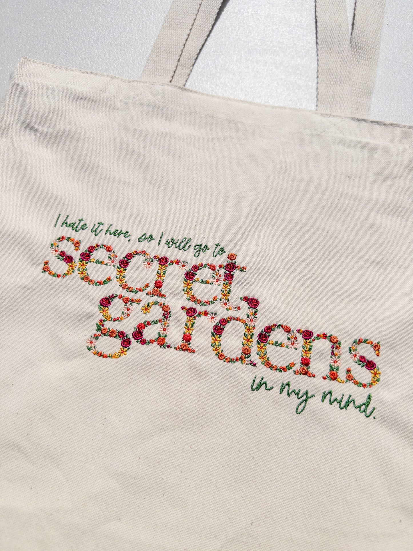 Secret Gardens ~ Hate it Here || Floral Embroidered Tee, Crewneck, Hoodie, and Tote bag